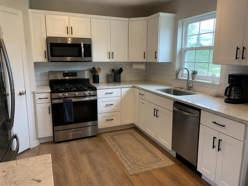 Finished kitchen remodel with new cabinets and countertops